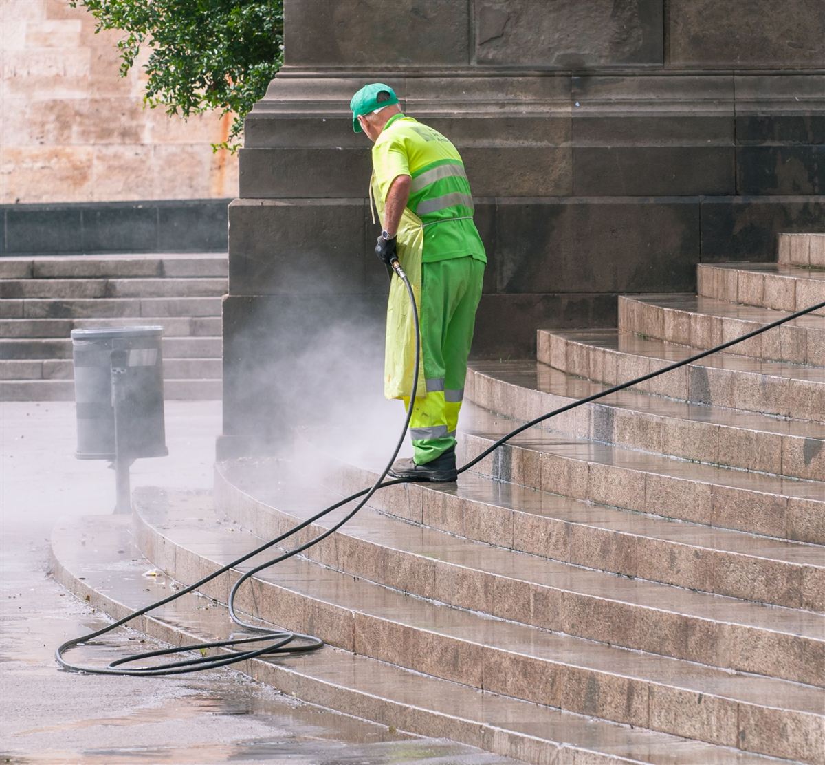 Driveway and stairs being pressure washed — representative finish example